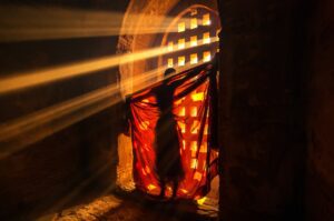 Back side of monk change the robe with sun ray in pagoda at bagan, mandalay, myanmar