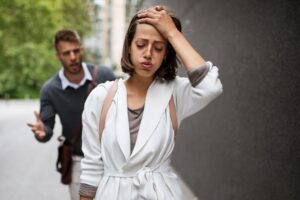 Breakup of couple with man and sad girlfriend outdoor. Divorce, couple, love, pain concept