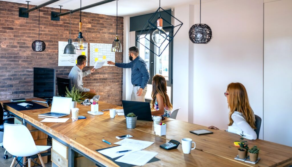 Team leader organizing work in an office