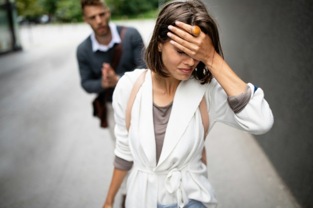 Breakup of couple with man and sad girlfriend outdoor. Divorce, couple, love, pain concept