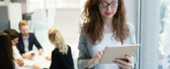 Elegant smart businesswoman in company office