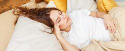 Portrait of a young girl sleeping on a pillow