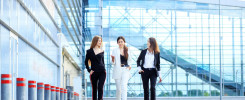 Successful women go and discuss a new project. Concept for business, boss, robot, team and success