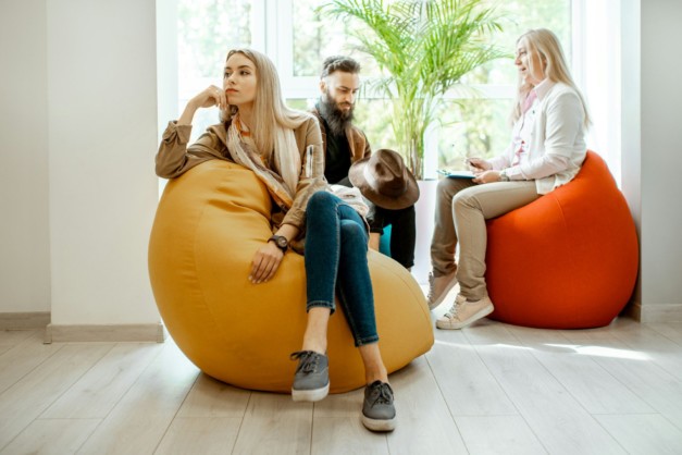 Young couple during the psychological counseling with psychologist